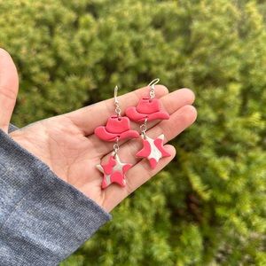 SOLD Western cow print dangle earrings